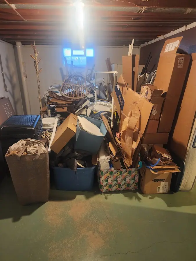 Roll-off dumpster container at job site for Construction Dumpster Rental in Momence